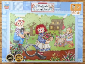 NEW/SEALED MasterPieces 60 Piece Jigsaw Puzzle "Raggedy Ann & Andy Bike Ride" - Picture 1 of 3