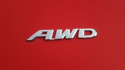 HONDA CRV CR-V ELEMENTO PILOTO AWD EMBLEMA CROMADO TRASERO LOGOTIPO INSIGNIA SÍMBOLO FABRICANTE DE EQUIPOS ORIGINALES C15 Foto 1 de 3