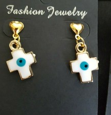 Gold tone and white evil eye cross post earrings