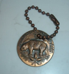 VINTAGE YELLOWSTONE NATIONAL PARK BRASS KEYCHAIN/MEDALLION - Picture 1 of 2