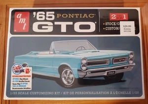 AMT 1965 Pontiac GTO 2 en 1 Kit 1/25 AMT 1191 SELLADO DE FÁBRICA - Imagen 1 de 8