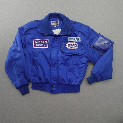 Chaqueta de nailon Nissan NISMO Grupo C L azul automovilismo internacional vintage 25x23 Foto 1 de 4