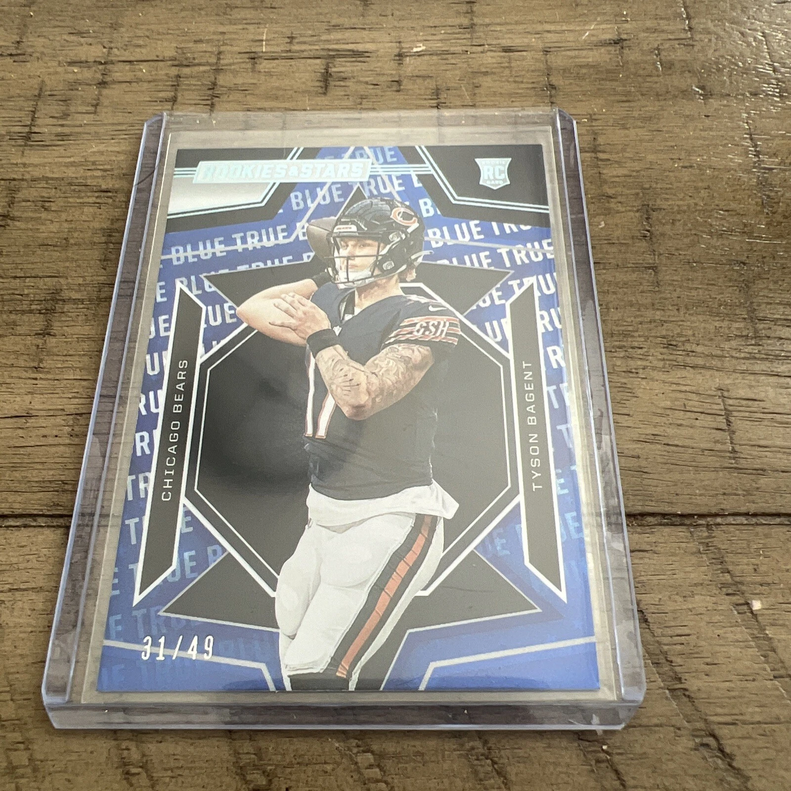 2023 Panini Rookies & Stars - Rookies True Blue #195 Tyson Bagent /49 (RC)