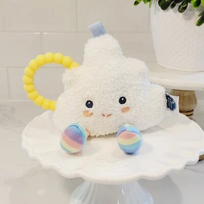 Juguete de sonajero de nubes suaves hinchadas MARY MEYER blanco con mango amarillo Foto 1 de 4