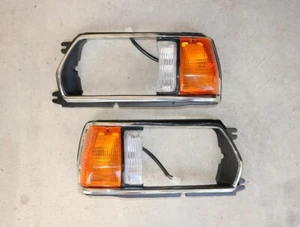 A PAIR RH+LH HEADLIGHT DOOR BEZEL RECT W/CORNER LAMP 80-81 SUBARU 1600/1800 - Picture 1 of 2
