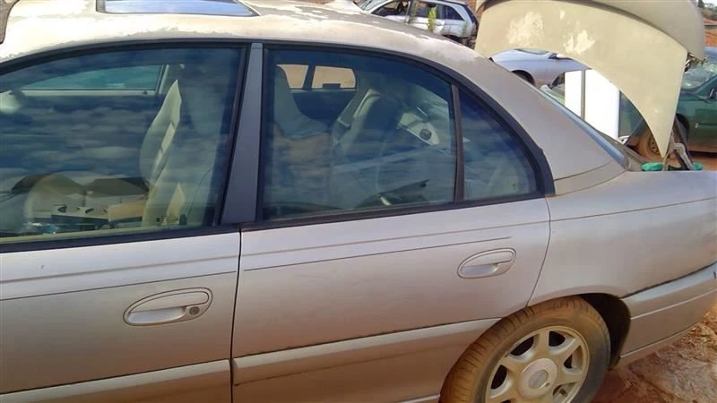 Puerta trasera izquierda del conductor para Cadillac Catera 97-01 OEM Foto 1 de 4