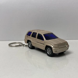 RARE KEY CHAIN GOLD JEEP GRAND CHEROKEE WJ CUSTOM LIMITED EDITION 1998 1999-2004 - Picture 1 of 2