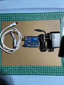 Arduino uno, cable, and charger cord