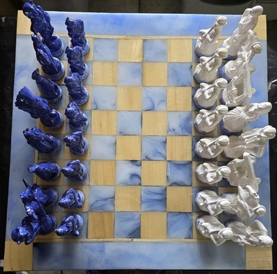 Ceramic Cowboy And Indian Chess Set And Resin Board.   - Image 1 of 4