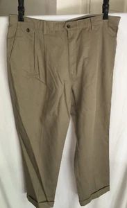 Pantaloni UOMO NUOVI MARRONE CHIARO KAKIS DOCKERS PLISSETTATI VESTIBILITÀ AMPIA CON POLSINI TAGLIA 42X30 - Foto 1 di 4