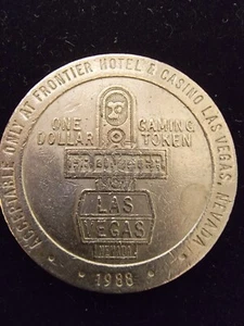 Frontier Hotel Casino Las Vegas 1988, $1 Dollar Gaming Slot Tokens - Picture 1 of 3