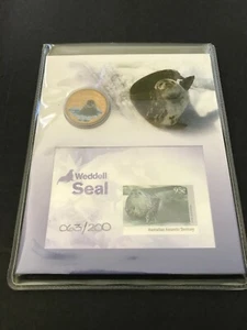 RAM Polar Seal $1 Coloured Frosted Unc Coin & Imperf Stamp Miniature Sheet  - Bild 1 von 1