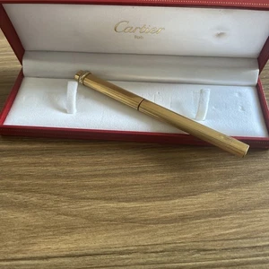 Bolígrafo Must de Cartier Vendome Trinity dorado - Imagen 1 de 6