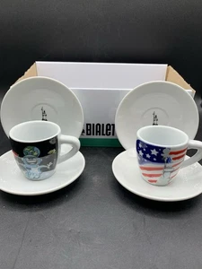 Set of 2 Bialetti Porcellana Espresso Cups and Saucers Astronaut, American Flag - Picture 1 of 15