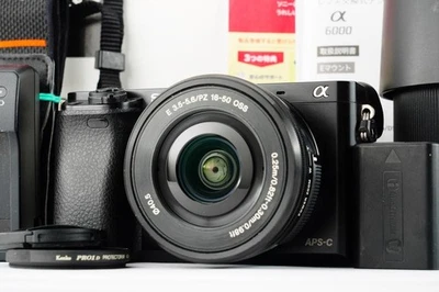 MINT Sony α6000 Dual Lens Kit 1867 Shots SEL55210 +Bonus 64GB Multi-Lang - Image 1 of 4
