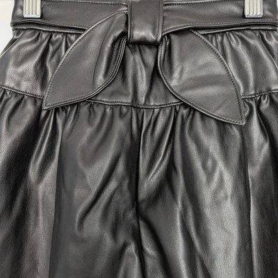 Pantalones Cortos Mayoral Niñas (Talla 7) Negros Imitación Cuero con Acento de Lazo Foto 1 de 4