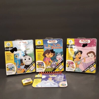 (4)  Leap Frog My First Leap Pad Preschool Dora Disney Train Game Cartridges #1 - Image 1 of 4