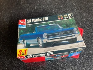 AMT ERTL '65 Pontiac GTO 1:25 3' n1 Model Kit As New - Foto 1 di 11