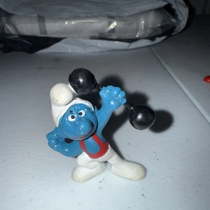 Vintage Schlümpfe stark kräftig Schlumpf Gewichtheben Hantel Langhantel Schleich Peyo - Bild 1 von 3