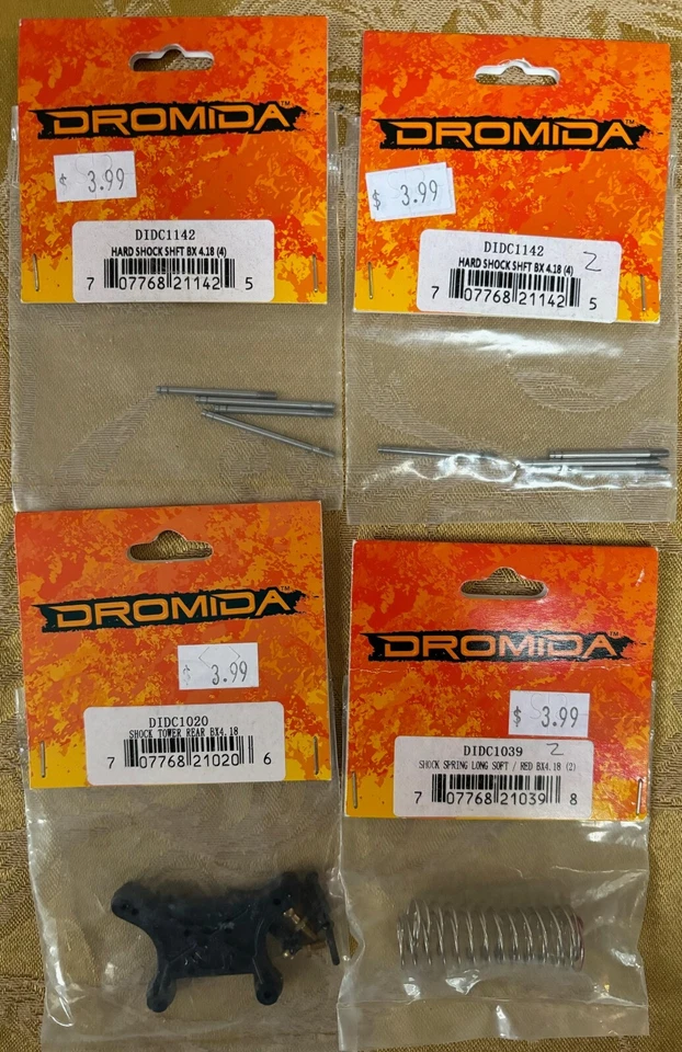 Dromida DIDC1020, 1039, & 1142 (2): Shock Tower, Springs (2) & Shafts, BX 4.18 - Image 1 of 1