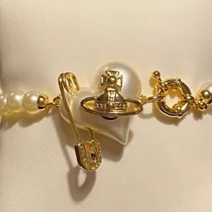 Vivienne Westwood Orietta Heart Orb gold plated bracelet - Picture 1 of 6