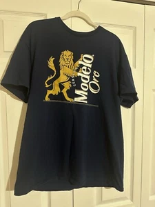 Cerveza Modelo Oro Men's Size XL Blue Beer Short Sleeve Graphic Tee - Picture 1 of 6