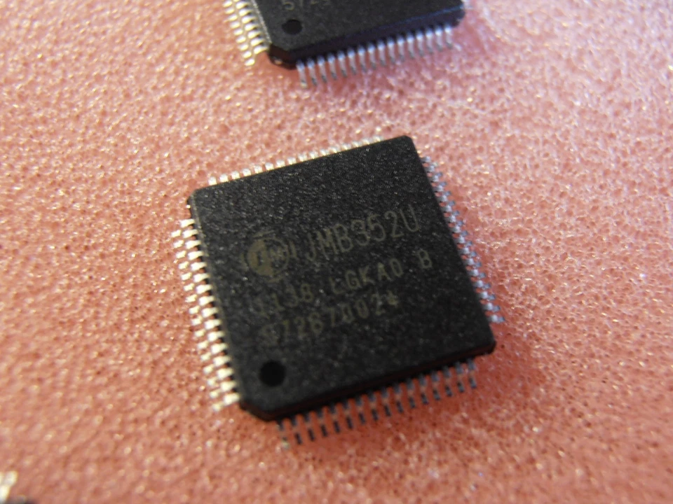 JMB352U-LGKA0B  USB & SATA II Combo to Dual SATA II Port Bridge LQFP64    - Image 1 of 1