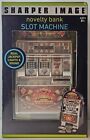 NEW in Box Sharper Image Novelty Bank Slot Machine Lights & Sound Toy Casino 777