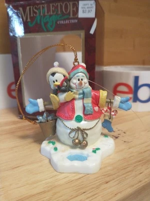 Walmart Stores Muérdago Mágico Muñeco de Nieve Pingüino Pesca en Hielo Cubo Bastones de Caramelo Foto 1 de 4