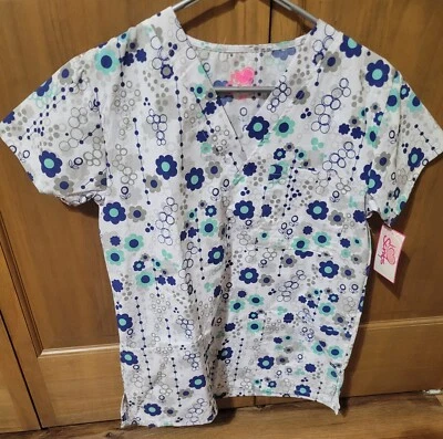 NWT - I LOVE SCRUBS BRAND SCRUB TOP  - FLOWER PRINT - SIZE: X-SMALL - Image 1 of 4