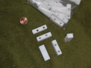 QTY 5 Teflon PTFE MACHINED BLOCKS 3/8 x 1-1/2 x 1/2 with 2 holes 3/16" holes - Picture 1 of 2