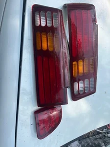 86 87 88 89 90 91 FORD TAURUS TAIL LIGHT SEDAN SHO RED AND AMBER LENS 86717 - Picture 1 of 4