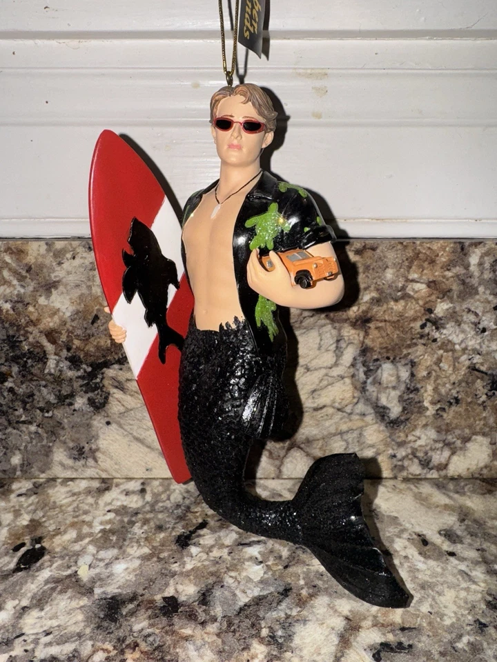 RETIRED December Diamonds 2008 “Woody” Surfer Merman Mermaid Christmas Ornament - Image 1 of 4