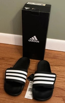 阿迪达斯男女通用 Adilette 舒适拖鞋(黑色)- 8 男式/9 女式 - 全新带盒 — 第 1/4 张图片