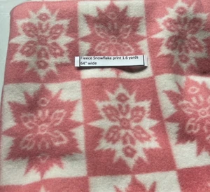 Fleece Salmon and White snowflake pattern that is 1.6 yards x 64” - Picture 1 of 2