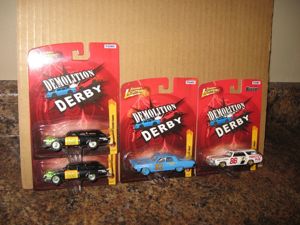 Johnny Lightning Lot of 4 Demolition Derby Caprice Fury Country Squire Wagon - Image 1 of 3