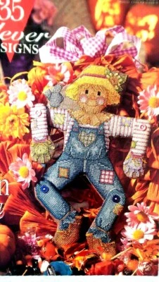 Cross Stitch Pattern SCARECROW Jointed Movement Arm and Legs Denim Flowers Fun - Image 1 of 4