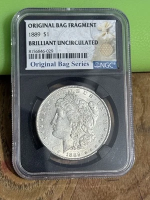 1889 P NGC Morgan Dollar Silver US Mint Uncirculated BU Coin Bag Fragment 1889-P - Image 1 of 2