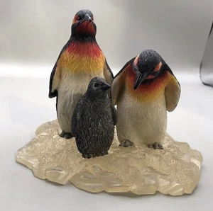 Family Of Penguins Floating On A Piece Of Ice - Picture 1 of 7