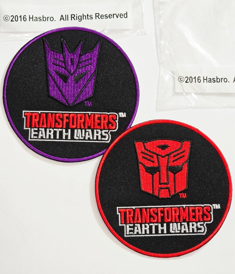 TRANSFORMERS EARTH WARS VIDEO GAME 2 PATCH LOT HASBORO 2016 PROMO ROBOT TOYS TOY - Image 1 of 4