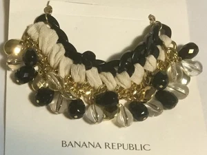 BANANA REPUBLIC BETTELKETTE TOGGLLE CREME SCHWARZ GOLD ARMBAND - Bild 1 von 2