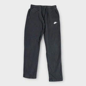 Pantalones deportivos Nike para hombre pequeños negros de vellón con logotipo deportivo bolsillos Swoosh - Imagen 1 de 17