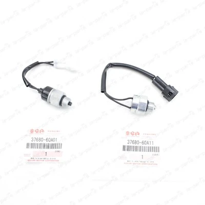 JUEGO DE INTERRUPTORES DE TRANSFERENCIA ORIGINALES SUZUKI 99-05 VITARA 4X4 37680-60A01 + 37680-60A11 Foto 1 de 4