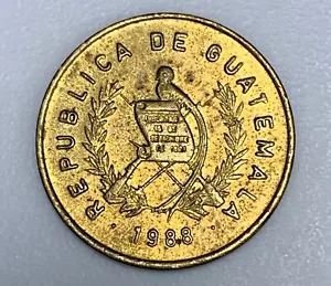 1988 REPUBLICA DE GUATEMALA UN CENTAVO BRASS COIN (1107) - Picture 1 of 2