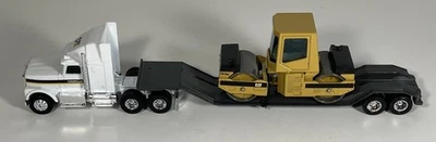 Ertl 1/64 Diecast CAT Hauler IH Semi Lowboy Trailer Joal CB-534 Compactor - Image 1 of 4
