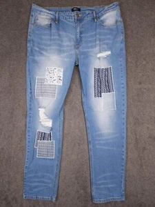 Fashion Nova Herren Medium Wash Distressed Patchwork Denim Jeans Größe 38x32 - Bild 1 von 15