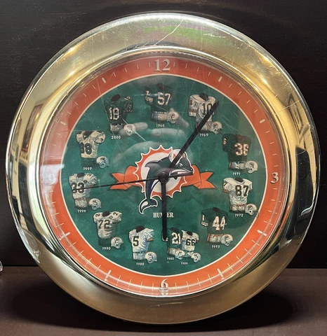 Miami Dolphins Uniforms Over the Years Wall Clock - WORKING Cover