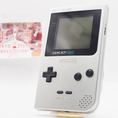 OEM Nintendo Game Boy Light SILVER console MGB-101 TESTED #72 [Mint, Rare No.] - Image 1 of 4