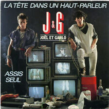 J & G* - La Tête Dans Un Haut-Parleur / Assis Seul (7")