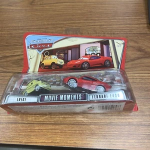 NIB DISNEY PIXAR WORLD OF CARS LUIGI & FERRARI F430 1/55 MOVIE MOMENTS M4938 - Picture 1 of 11